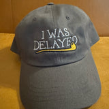 I Was Delayed Dad Hat