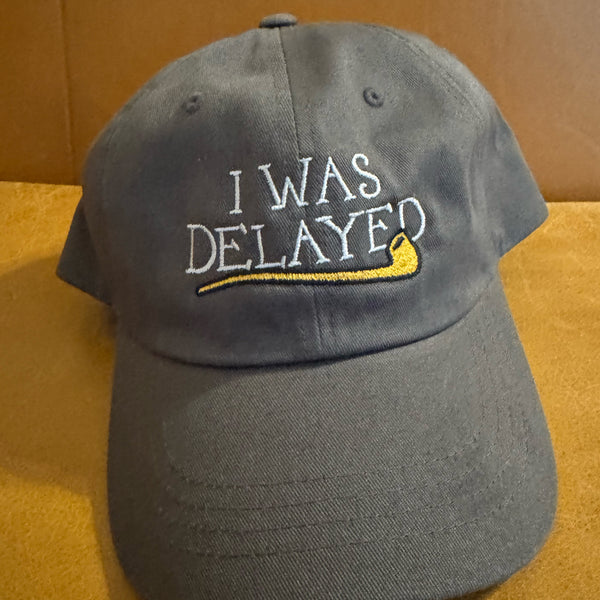 I Was Delayed Dad Hat